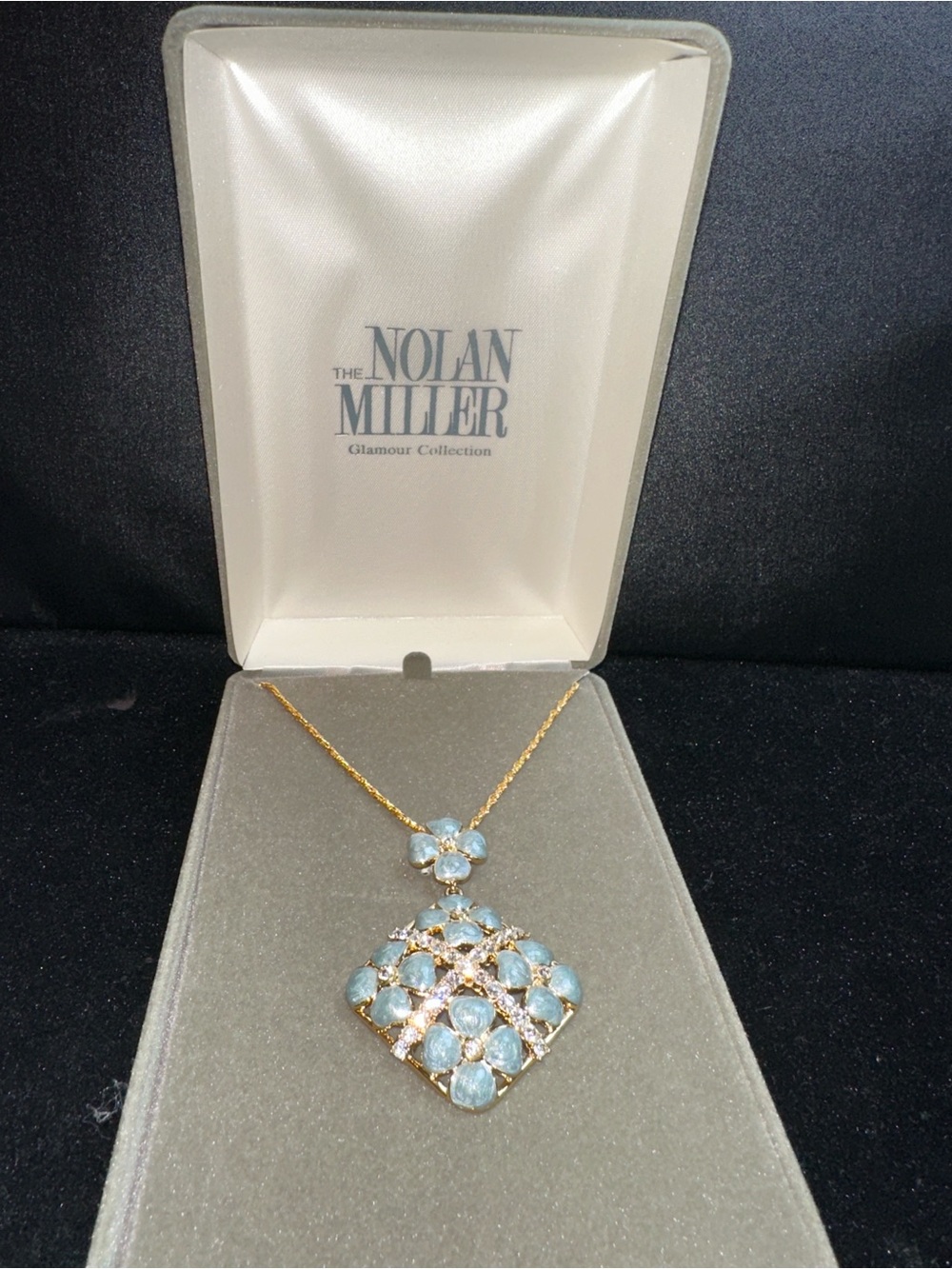 Nolan Miller Gold-Tone Pendant Necklace with Light Blue Stones